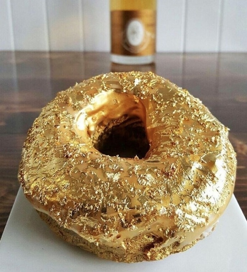 Doughnuts might not be considered refined food. Nevertheless, when made with purple yam, Cristal Champagne jelly, and coated in 24-karat gold dust and flakes you may see this $100 dessert differently.