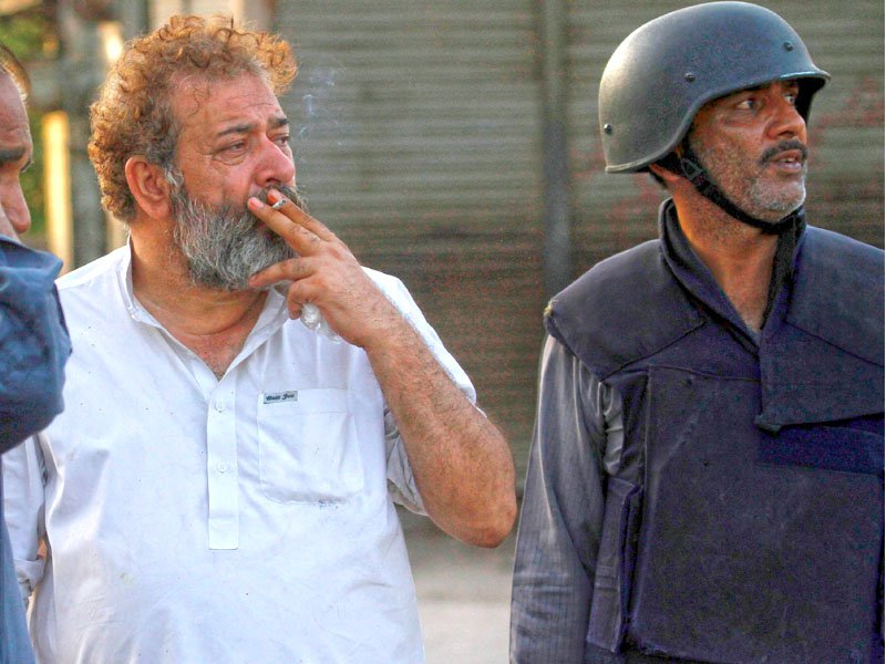“The look of a man who knows that it won’t be the cigarette that will kill him.” CID Chaudhry Aslam Khan, a police superintendent in Karachi, one of the world’s most dangerous cities. He was assassinated in 2014 by a Taliban bombing.
