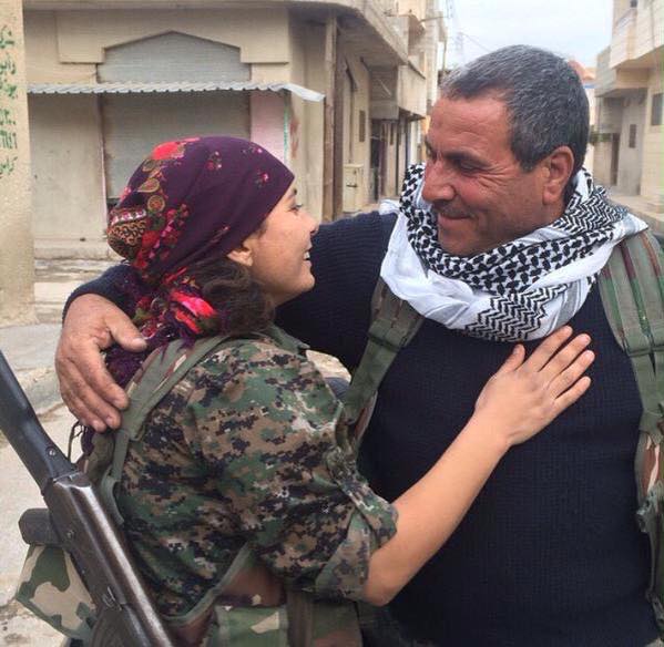 Father (YPG fighter) and daughter (YPJ fighter) reunited after months of fighting ISIS in Kobanê.