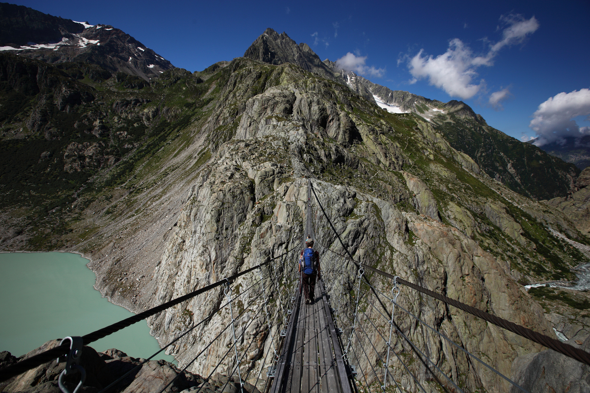 Cross the Trift Suspension Bridge (the longest pedestrian only suspension bridge in the Swiss Alps) 328 feet high and 557 feet long above the Trift Glacier.