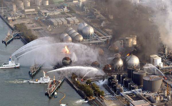 In March 2011, Tepco's Fukushima Daiichi facility located approximately 124 miles northeast of Tokyo was hit by a giant tsunami with 17 meter high waves that were created by a 9.0 magnitude earthquake. 

Operators lost control of the plant when the power supply, including emergency back-up, failed amid massive flooding. As cooling systems malfunctioned, reactors 1, 2 and 3 suffered meltdowns. (Reactor 4 was closed for routine maintenance at the time, but one of several hydrogen explosions blew the walls and roof off the reactor building.) 

Radiation leakage following the explosions forced the evacuation of tens of thousands of people from the surrounding area. An exclusion zone, roughly 11 miles by 19 miles, remains in force around the plant, and the entire facility is now being decommissioned. However, Tepco's clean-up, which has been sharply criticized by environmentalists, is expected to take up to 40 years. They have, so far, been unable to remove hundreds of fuel rods stored nearby because the earthquake destabilized or destroyed large parts of the buildings they are stored in. Furthermore, radiation continues to contaminate underground water.