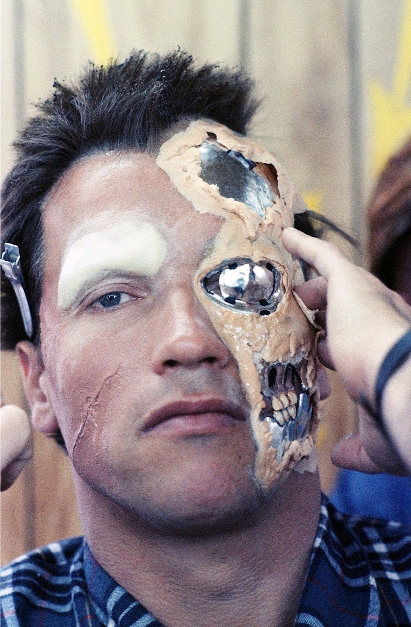 The Terminator himself Arnold Schwarzenegger getting his face prosthetics applied.