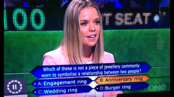 newsreader - 100 Which of these is not a piece of jewellery commonly worn to symbolise a relationship between two people? A Engagement ring BAnniversary ring CWedding ring DBurger ring