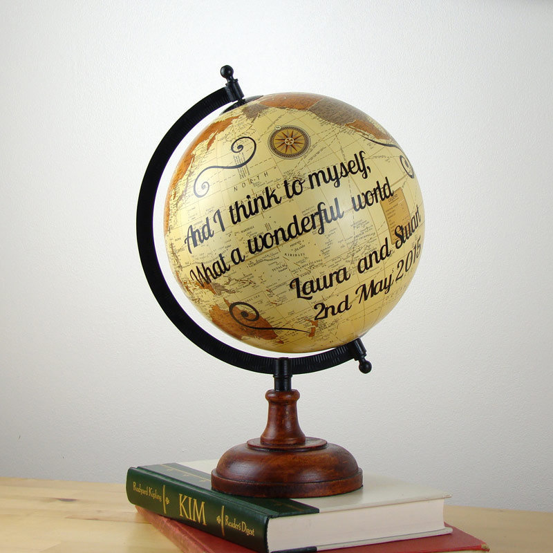 If you know a couple who is taking the next big step, whether it be moving in together or celebrating a Golden Anniversary, consider this personalized World Globe.