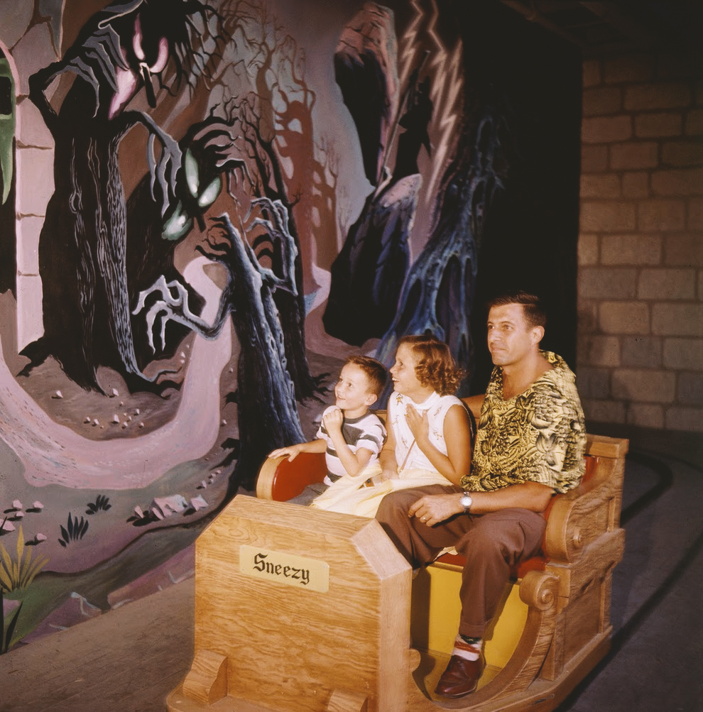 Guests on the “Snow White and her Adventures” ride on the opening day of Disneyland (1955).