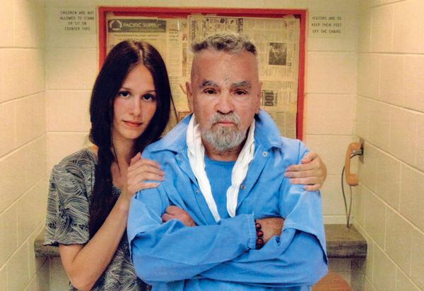 Incarcerated cult leader Charles Manson has long had adoring women sending him love letters, even though he has no chance of parole. Twenty-seven-year-old Afton Elaine Burton, who goes by the nickname “Star,” got closer than most to the psycho. She began writing and visiting Manson, bringing him toiletries and posing with him for photos, telling the world they were in love. They even got a marriage license and were going to tie the knot, when Manson abruptly called it off. The official reason was due to “an interruption in logistics," but Manson expert Daniel Simone says it was called off because the marriage was a ruse to gain legal control of his corpse after he died and display it as a tourist attraction.
