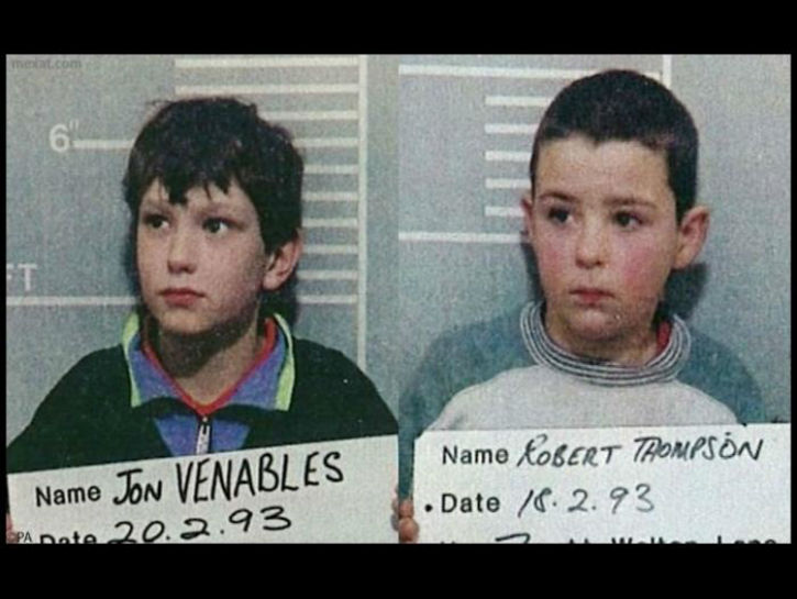 In 1993, two-year-old James Bulger was abducted from a mall in Bootle, England. Ten-year-olds Jon Venables and Robert Thompson weren’t only responsible for the little boy’s kidnapping, but also for his brutal murder, torture and mutilation. They led the boy through a 2.5 mile walk through Liverpool. They dropped him on his head, leading to injuries to his face. Thirty-eight people saw the three boys on their walk, but no one called the police, assuming the two boys were with their younger brother. They led James to a railway line and began torturing him.

They poured paint into the boy’s eyes, kicked and stomped him, and threw bricks and stones at him. They put batteries in his mouth and finally, a 22-pound bar was thrown on top of him, fracturing his skull. James suffered so many injuries – 42 in total – that it was never determined which one was fatal.

Before leaving James behind, Jon and Robert laid him across the tracks and covered his head in rubble, hoping a train would hit him and make his death look like an accident. His body was, in fact, cut in half by a train.

The two boys were arrested after one of them was recognized on CCTV footage of the mall, and they were imprisoned until they were 18, making them the youngest convicted murderers ever. They were released on parole under new identities.