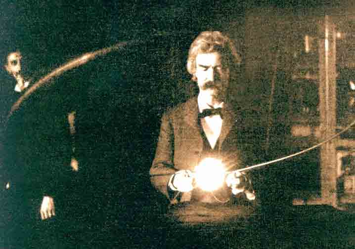 Mark Twain fools around in the laboratory of Nikola Tesla, 1894.
