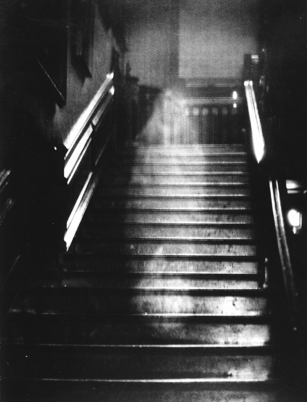 Taken on September 19, 1936 by Captain Hubert C. Provand, a London-based photographer working for Country Life magazine, this photo shows a ghost known as the Brown Lady of Raynham Hall. Considered one of the most famous ghosts in Britain, she reportedly haunts the Raynham Hall in Norfolk, England.