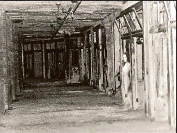 Taken at the Waverly Hills Sanatorium in Kentucky, this picture shows what is rumored to be a ghost of a nurse who committed suicide in Room 502. Legend says the nurse found out she was pregnant by the owner of the sanatorium without being married and had contracted tuberculosis, so she hanged herself with a light bulb wire outside her room. Now closed, the sanatorium is one of the most haunted hospitals in the US.