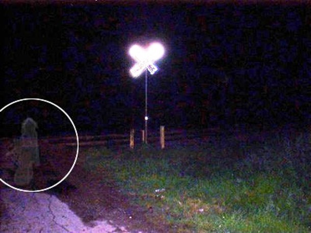 This picture shows strange child-like apparitions at a railroad crossing in San Antonio, Texas. Allegedly, the crossing is haunted by ghosts of children who died there in a tragic accident in the 1940s. Since then, any car that stops at the crossing is believed to be pushed across the tracks to safety by the child ghosts.