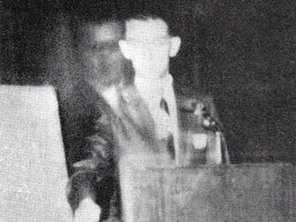 This photo was taken on November 16, 1968 when Robert A. Ferguson was giving a speech at a Spiritualist convention in Los Angeles, California. Faintly appearing next to Ferguson is a figure that he later identified as his brother, Walter, who died in 1944 during the World War II.