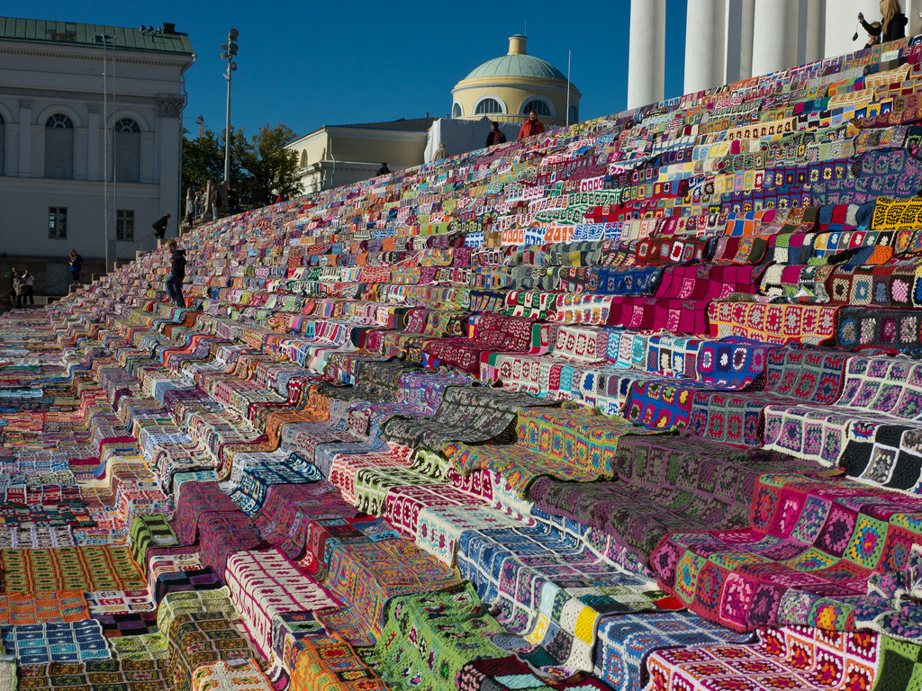 The world's largest crochet quilt gracing the stairs of the Helsinki Cathedral.