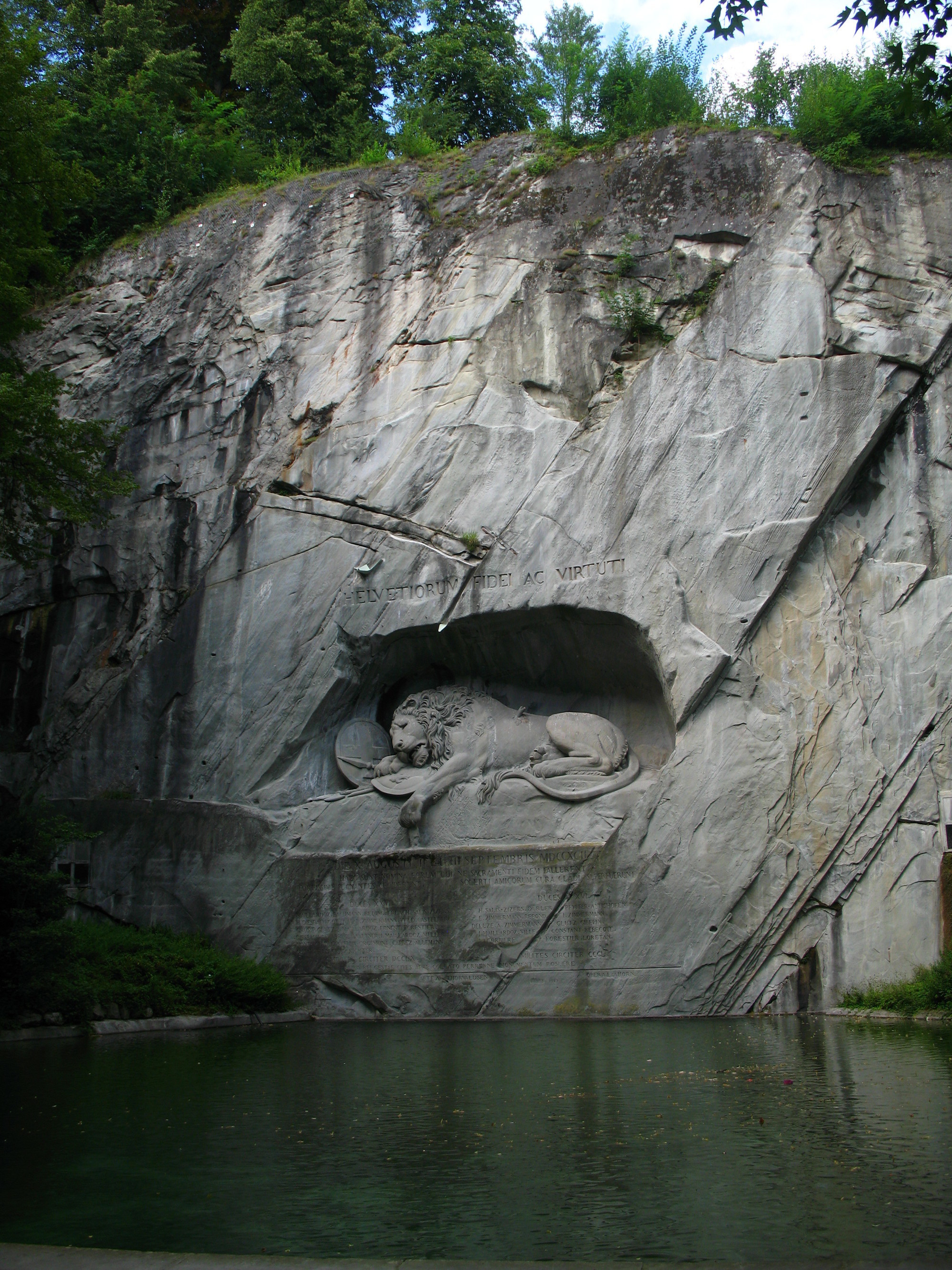 The Lion Monument in Lucerne, Switzerland, commemorates the Swiss Guards who were massacred during the French Revolution.