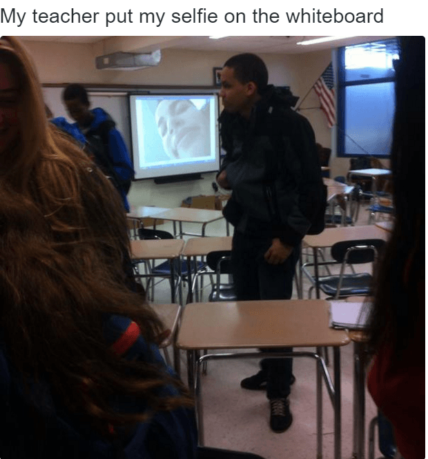 communication - My teacher put my selfie on the whiteboard
