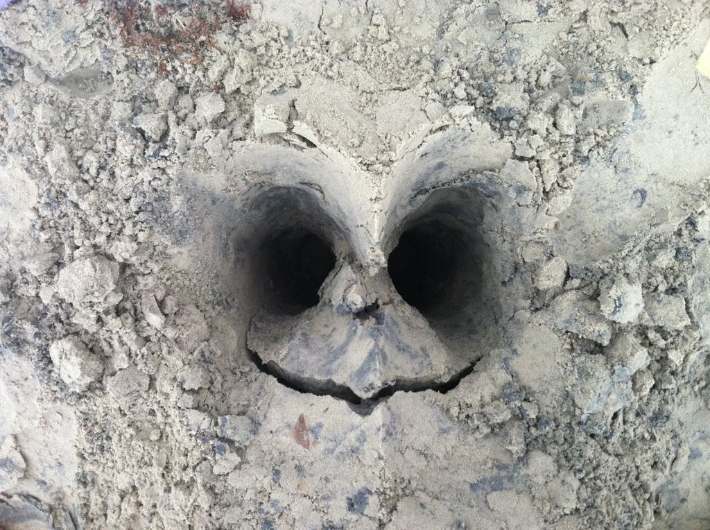A haunting imprint left behind after a corpse was buried in the same spot in the sand.