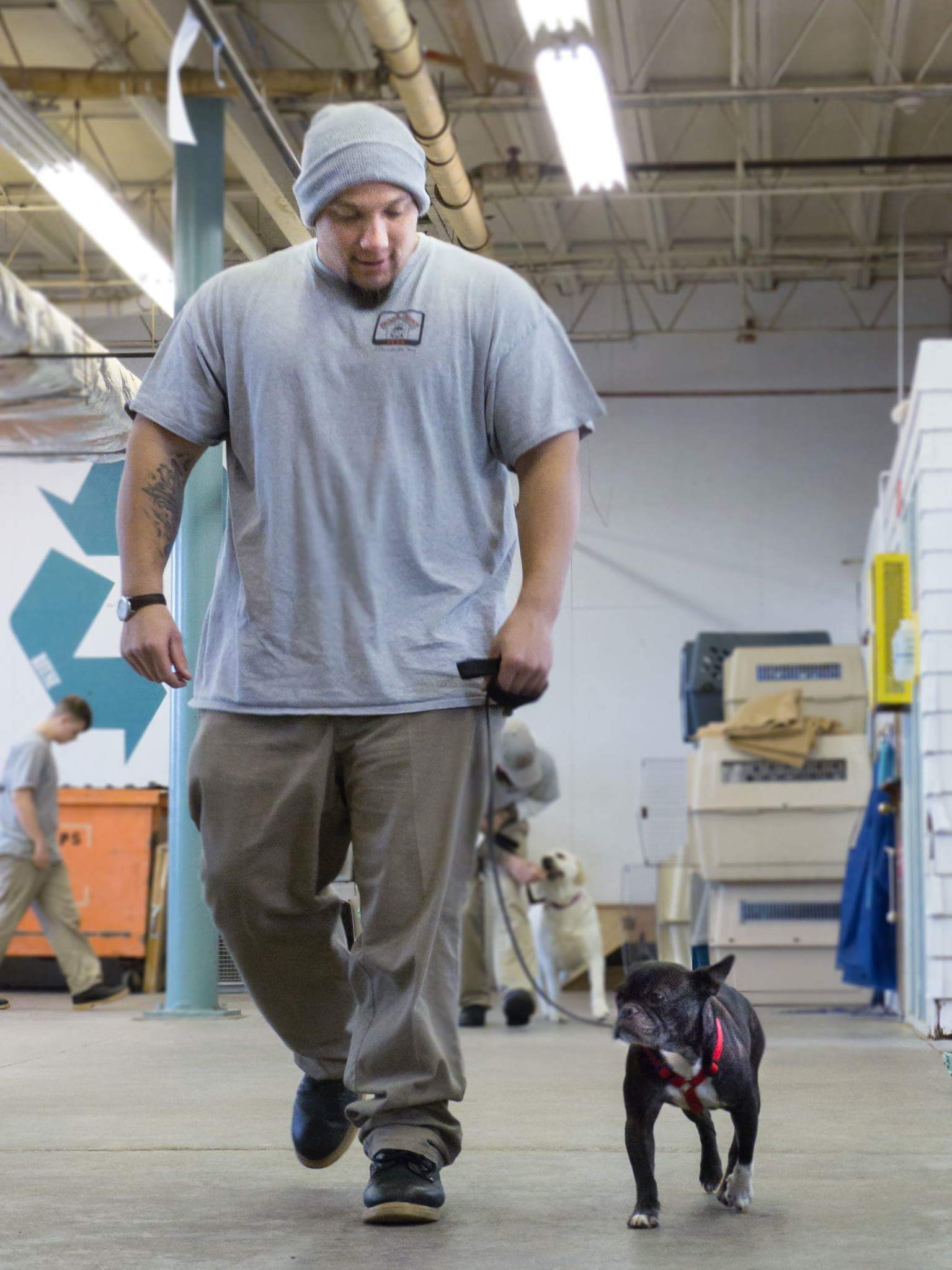 Bella and her trainer at the Nebraska State Penitentiary. Second Chance Pups program