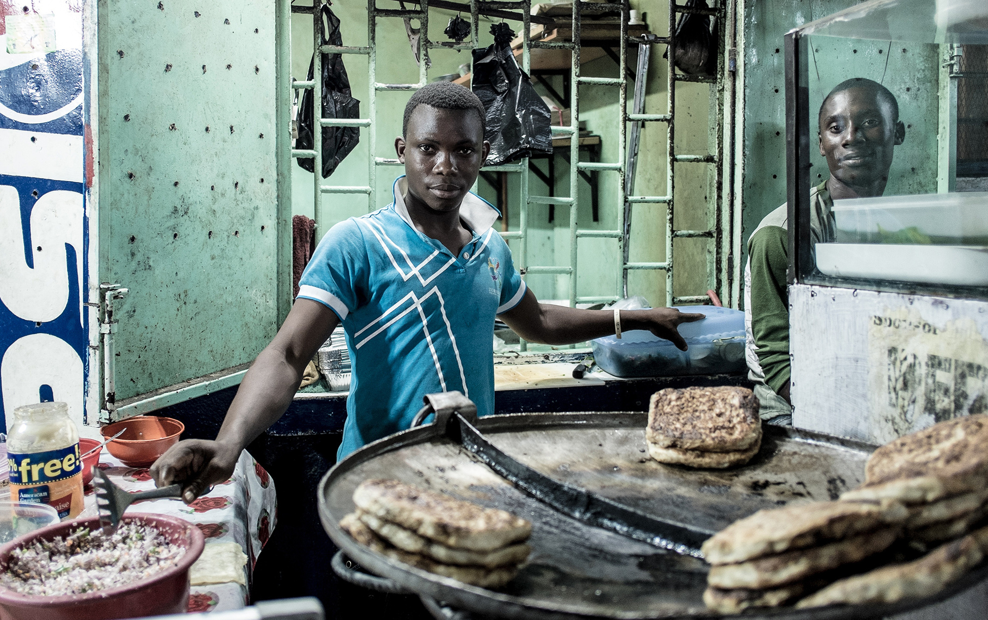 A chef makes a thin stuffed flatbread in the Tanzanian city of Dar es Salaam.