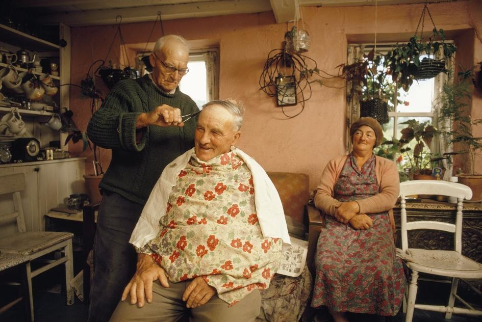 A farmer turns his kitchen into a barbershop on Sark of the Channel Islands.