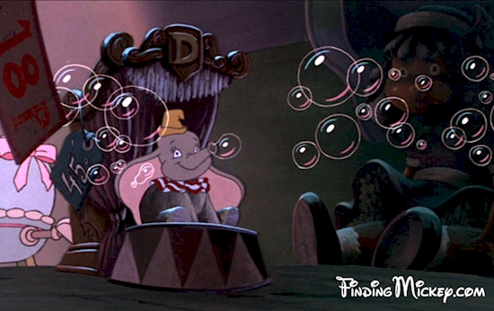 In The Great Mouse Detective, Basil and Dr. Dawson are in pursuit and they pass by a Dumbo toy blowing bubbles into the air.