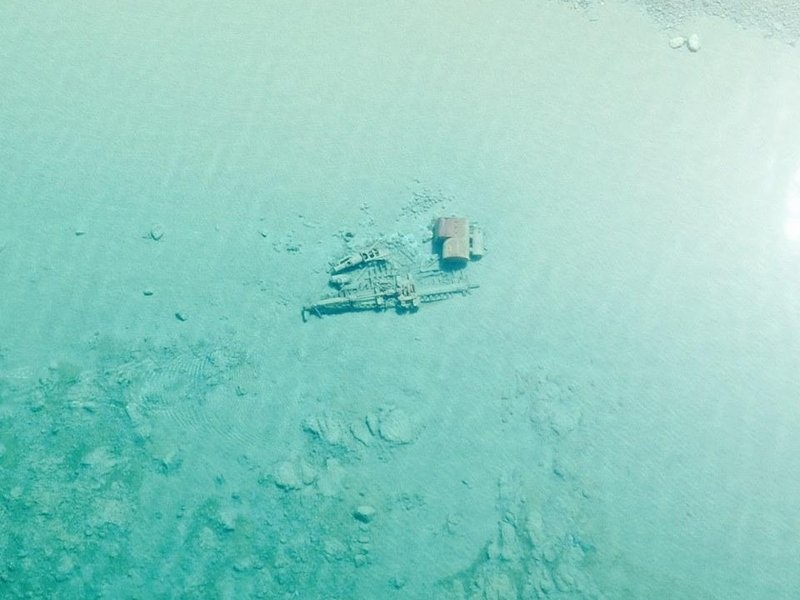 After winter passes, you can see sunken ships at the bottom of Lake Michigan from the sky.