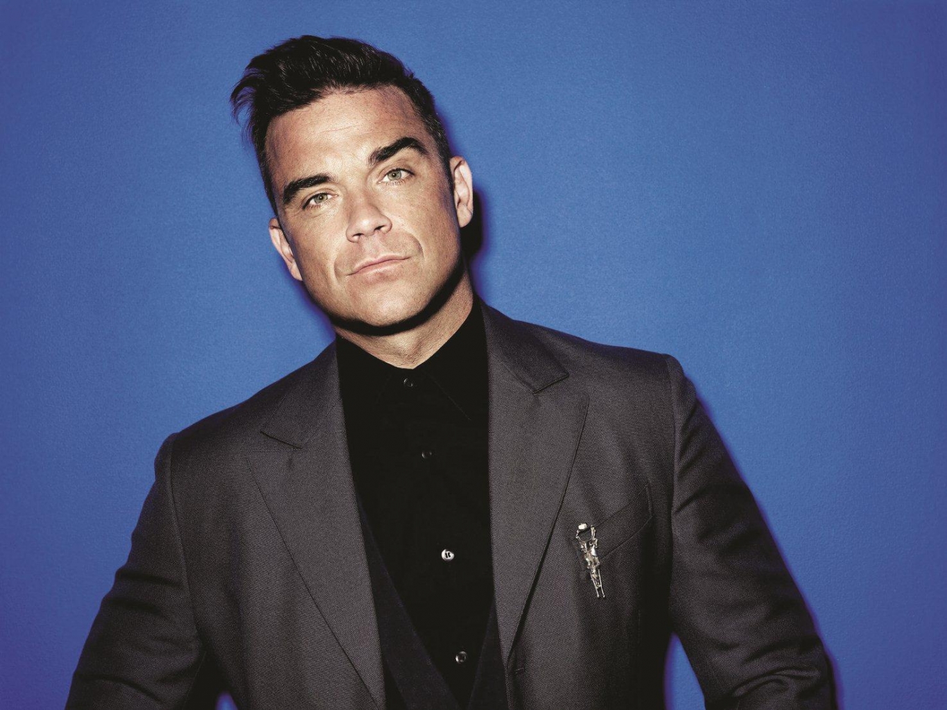 In 2001, Robbie Williams was attacked and thrown off stage while performing a concert in Germany. His attacker was reportedly suffering from psychiatric problems.