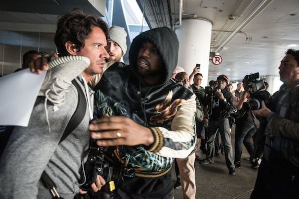 In February 2016, Kanye West found himself on the right side of things (for once) as he played peacemaker in a fight between two members of the paparazzi. 

Yeezy was walking through the airport when he was swarmed by a frenzied group of photographers. As the cameramen tried to get in position for a close-up of the rapper, things got heated. TMZ captured footage of two men starting to throw down, with one man throwing a punch and kick. West quickly stepped in to stop the tussle and hugged the angered man to quell the beef.