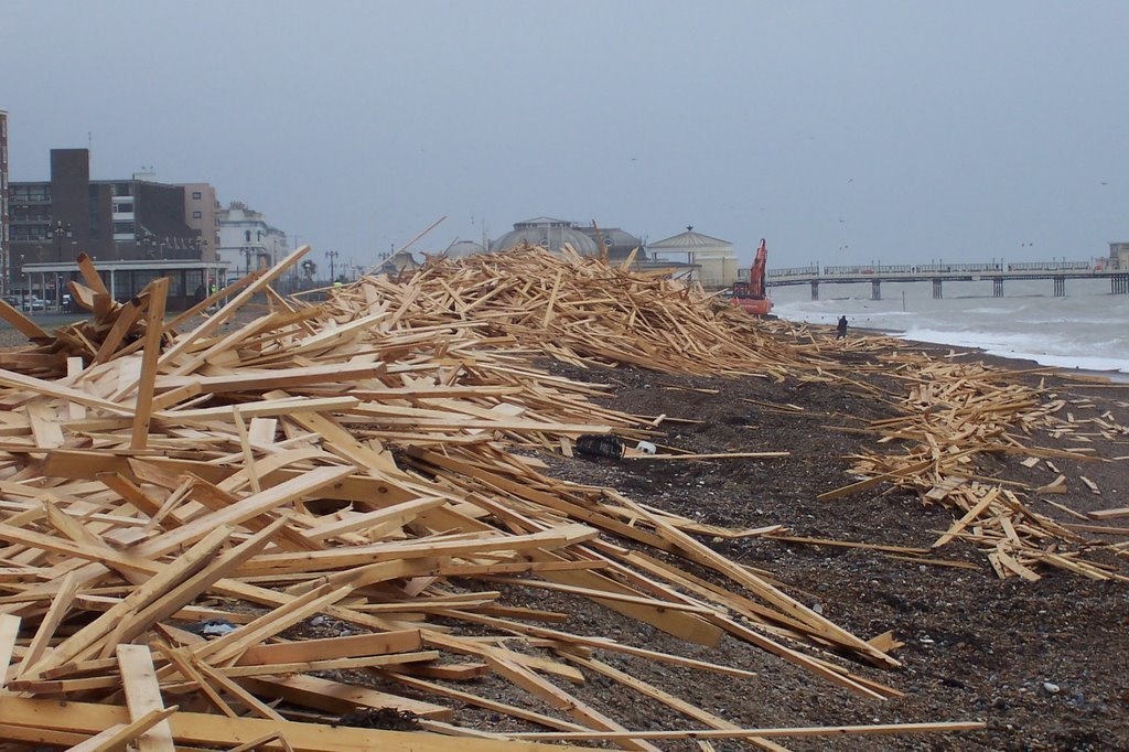 Tons of timber washed on to the shore of Worthing Beach, Sussex in the United Kingdom