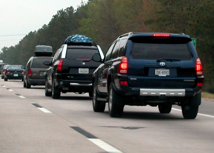 When convoying with other cars, the lead car should turn the blinker on first, followed by the 2nd, 3rd ect cars. Then the last car makes the lane change, and creates room in front for the next car to make their change. This prevents breaking the line up