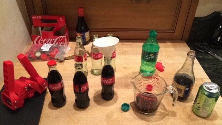 Pour soy sauce into glass Coke bottles, then reseal them.