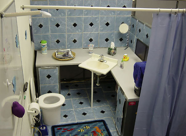 Transform a coworker's cubicle into a bathroom.