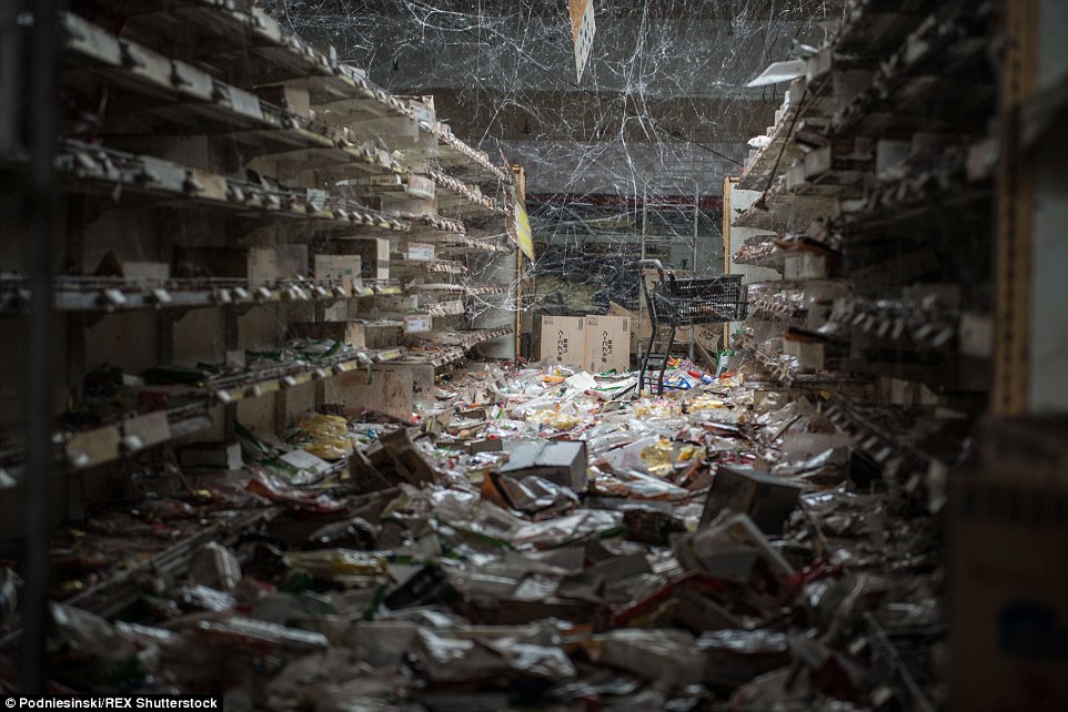 The evacuation was sudden leaving behind fully stocked supermarkets (now home to giant cobwebs) and abandoned cars still sitting in traffic.