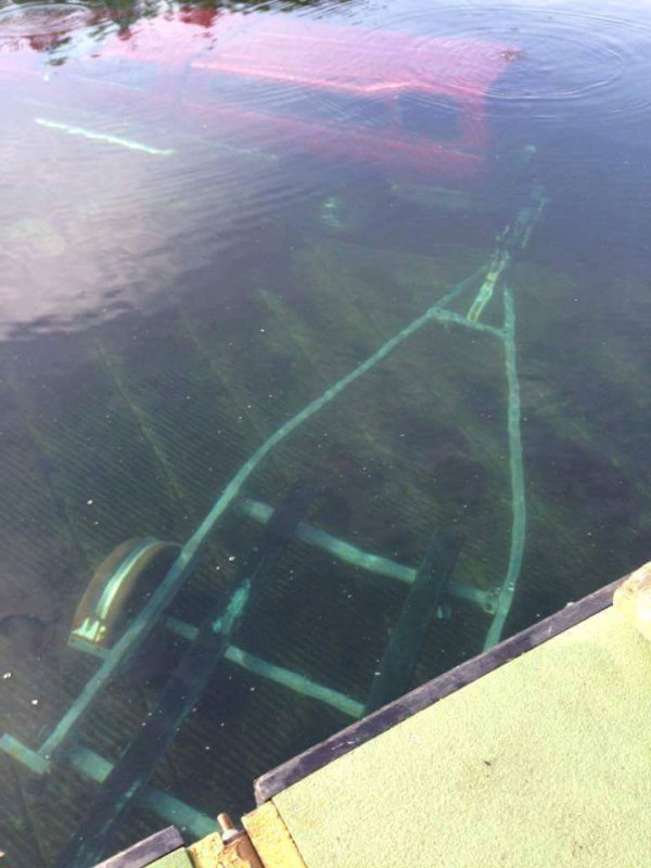 truck and boat in water