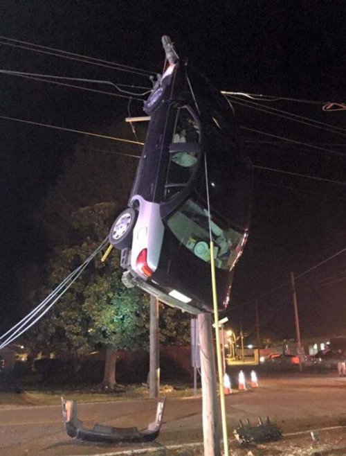 car stuck on pole