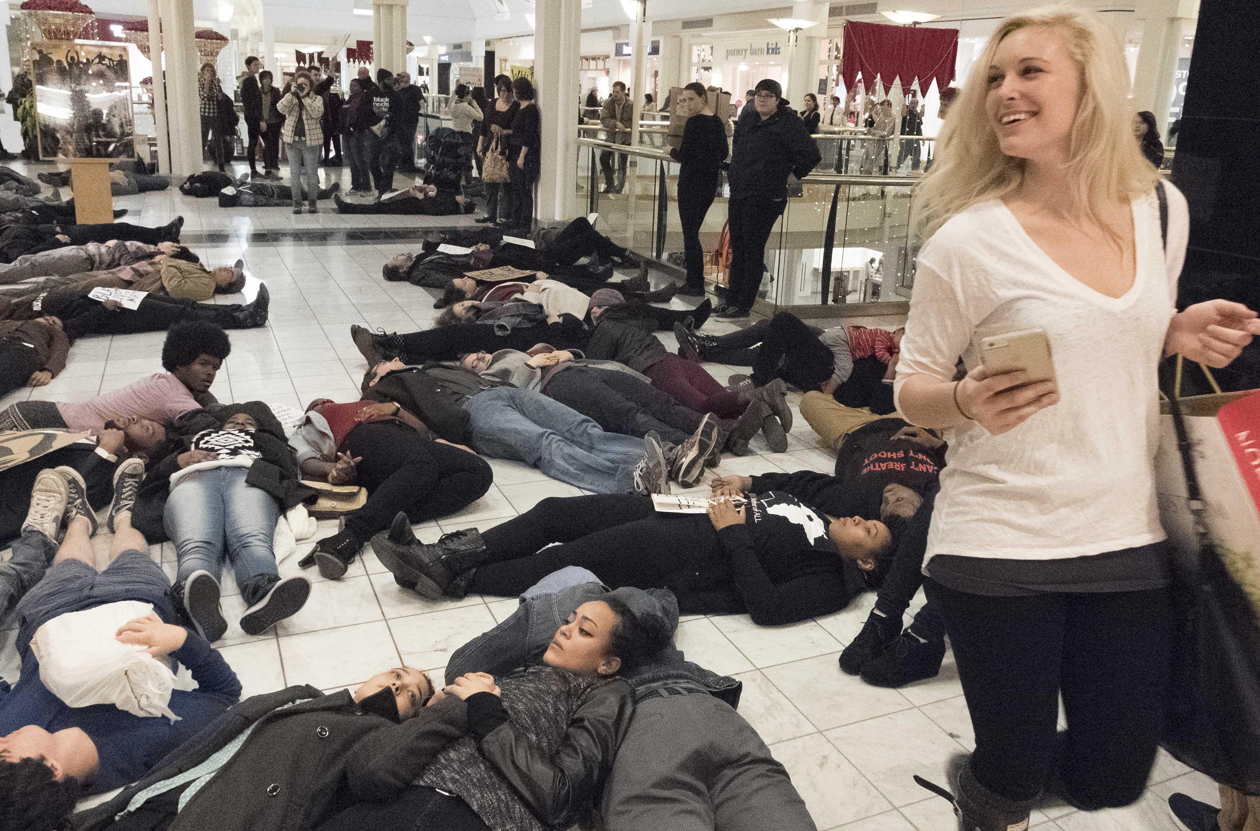 Woman shopping among Black Lives Matter protestors