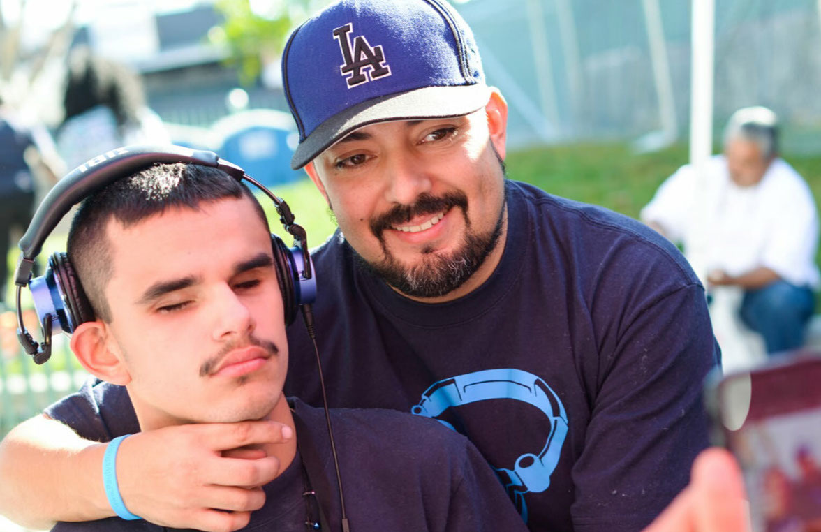 Pauly was born blind and autistic, his family learned music was the only thing that could soothe their son. Pauly and his dad Paul Avila wanted to spread the joy of music. The two use their own money to buy radios and headsets to donate to the homeless on skid row.