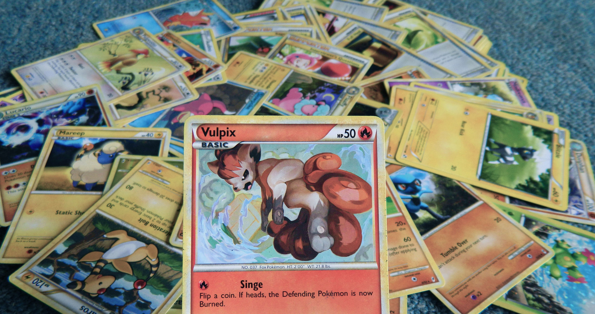 Watching Pokemon on TV and playing with the training cards in real life