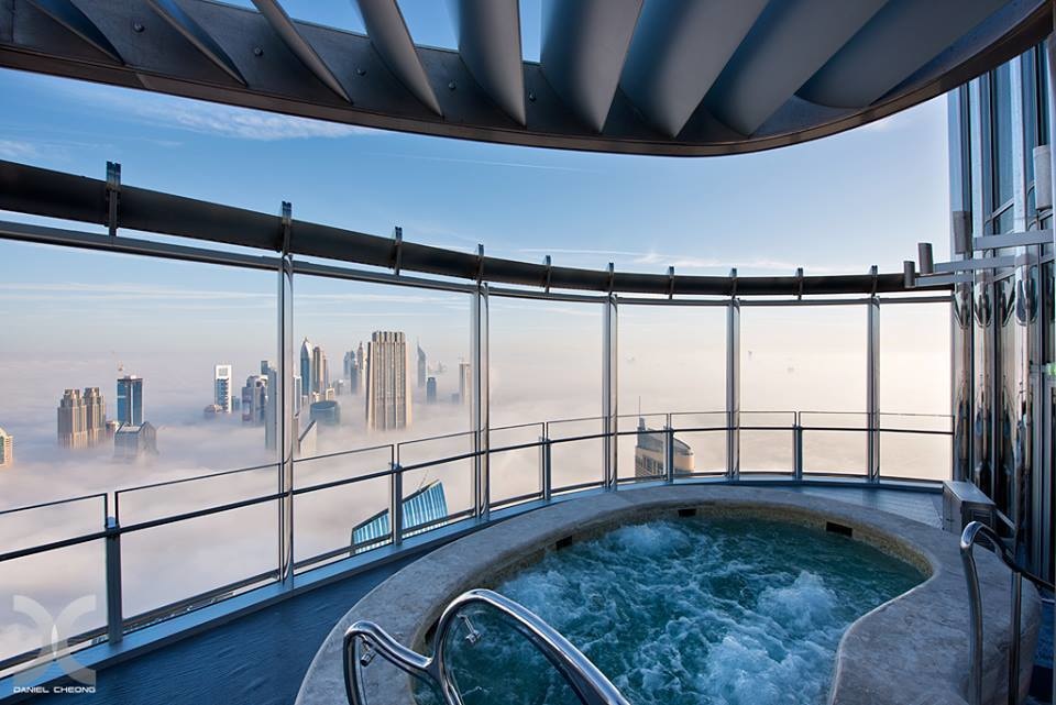 A hot tub that's above the clouds.