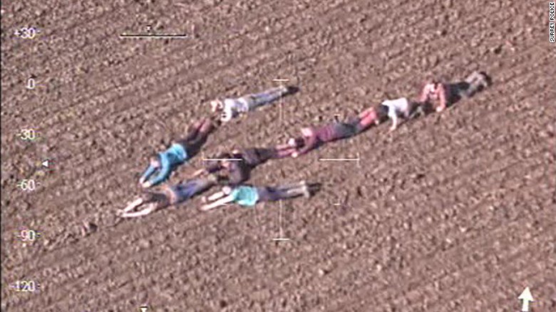 Kids on Easter egg hunt form human arrow to point police chopper toward suspects on the run