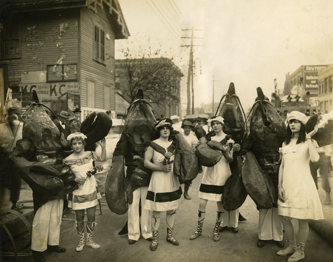 Men and women in costume (the men are dressed as crawfish) during Houston's No-tsu-oh Festival in 1913.