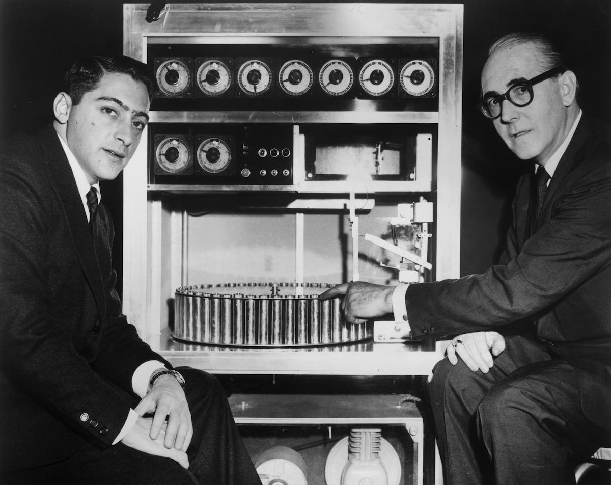 Film producer Mike Todd Jr with Hans Laube, the inventor of Smell-O-Vision. The device injected at least 30 odors into a movie theater, triggered by the film's soundtrack.