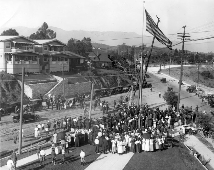 Los Angeles celebrating the beginning of electric distribution in 1916. Here, the first power pole is being installed on the corner of Pasadena Avenue and Piedmont Street.