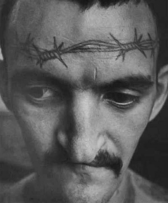 A Barbed wire across the forehead indicates a Lifetime served.