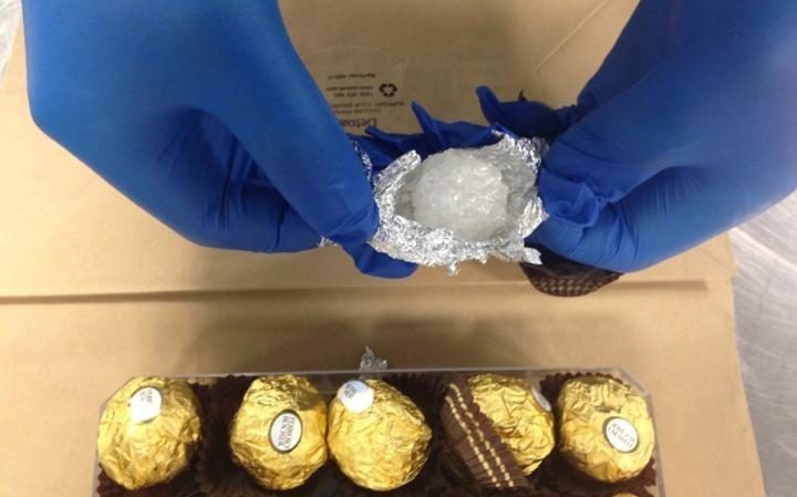 This is the one time we'd say no to this chocolate: A woman was arrested for attempting to smuggle crystal meth in Ferrero Rocher wrappers.