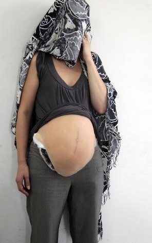 Canadian Ritchie Tabatha Leah was detained at Bogota Airport after she pretended to be pregnant -- really, it was just a fake belly, full of cocaine.