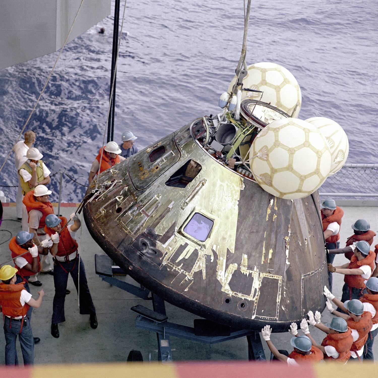 Recovering the Apollo 13 Command Module shortly after its water landing.