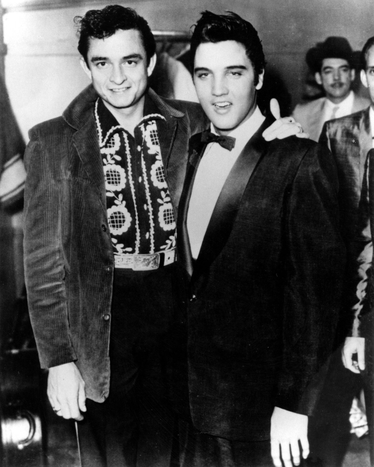 Elvis Presley and Johnny Cash pose in Memphis, Tennessee in 1957.