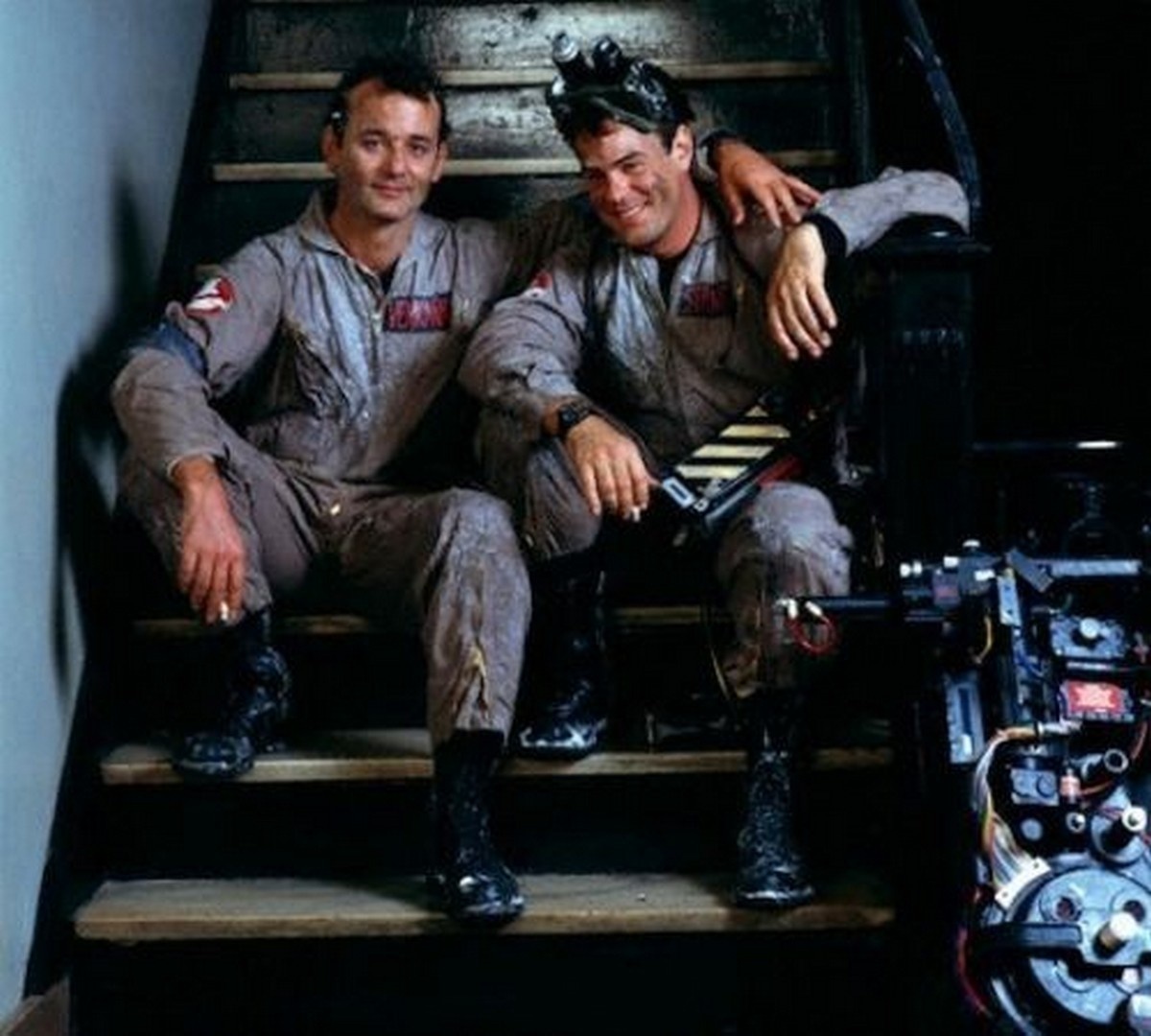 Bill Murray and Dan Aykroyd taking a break on the set of Ghostbusters in 1984.