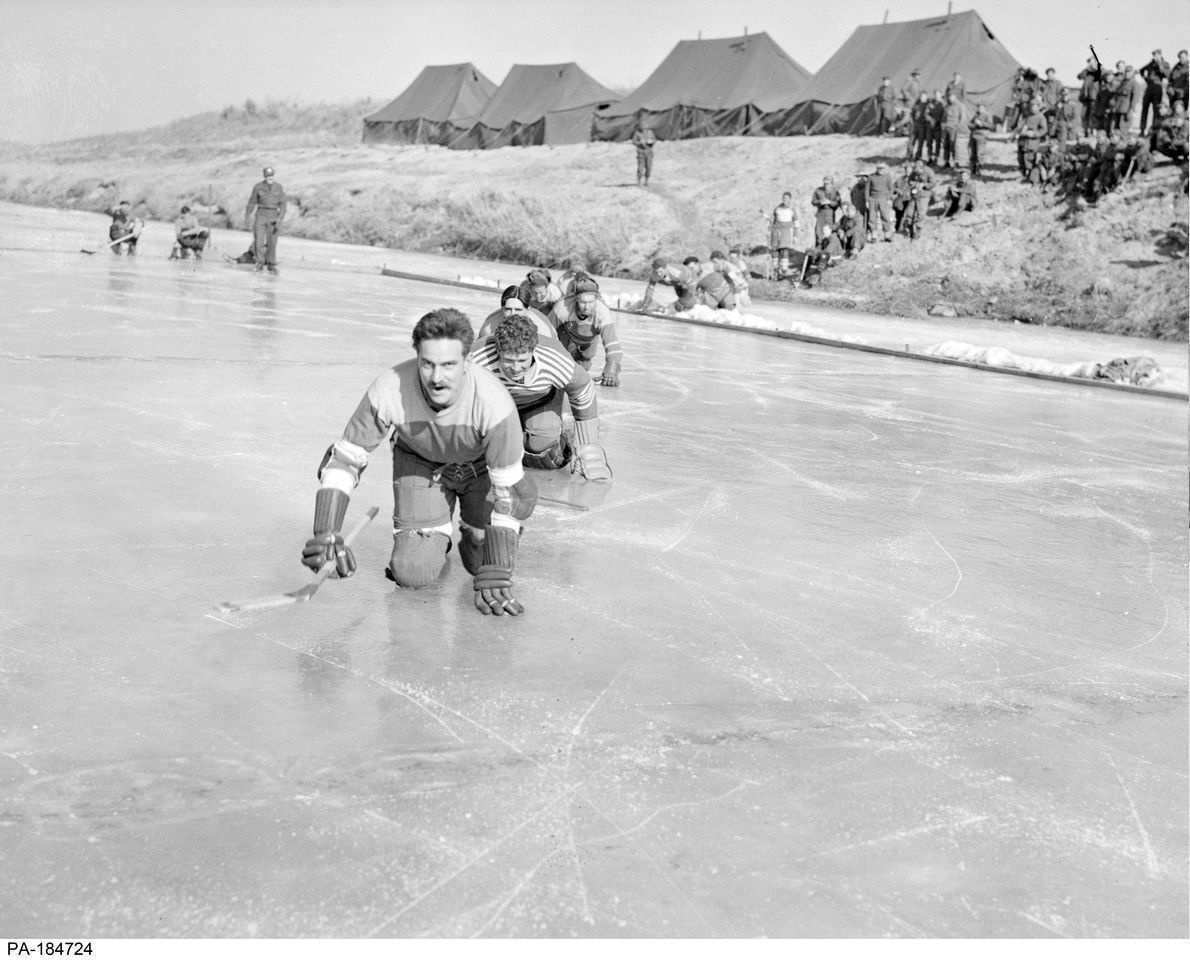 Canadians during the 1951 Imjin River hockey game in Korea.
