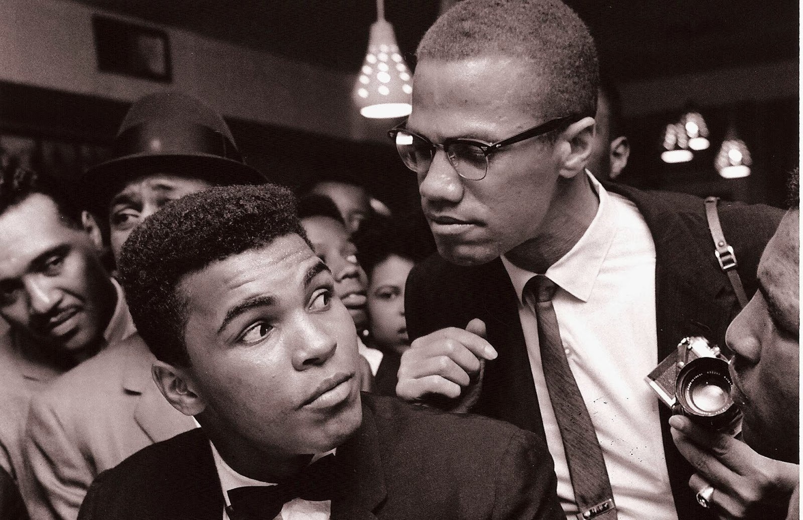 Malcolm X kidding around with Muhammad Ali in 1963.